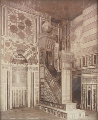 an old photo of a very ornate room with a staircase