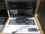 two laptops that are sitting on a table