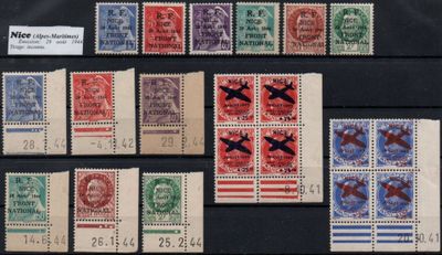 several different types of stamps are on display on a black surface