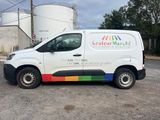 a van that is parked in a parking lot