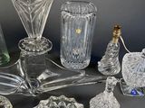 a lot of glass items that are on a table
