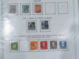 a picture of a sheet of stamps with a picture of people on them