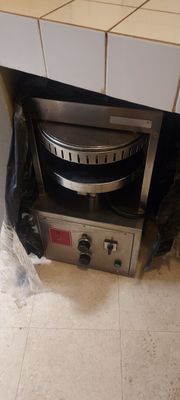 an image of a toaster oven under a counter