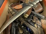 a box full of different types of knives in it