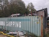 a shipping container that is sitting on the ground