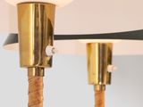 a close up of a lamp with a black shade on it