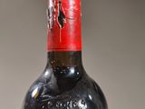 a bottle of wine that is sitting on a table