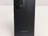 a close up of the back of a black samsung galaxy s20