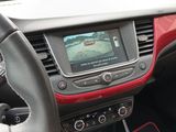 the dashboard of a car with a view of a golf course on the screen