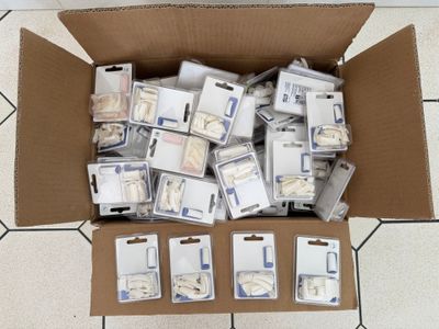 a cardboard box filled with assorted electronic components