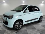 a picture of a white smart car parked in a showroom