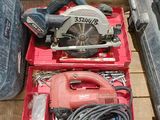 a red tool box with a circular saw and a corded circular saw