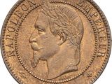 a close up of a coin with a man ' s head on it