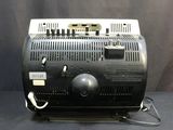 a black and white toaster sitting on a table