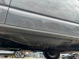 an image of a car that is parked in a parking lot