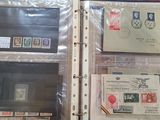 a lot of stamps on the inside of a binder