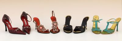 several pairs of women ' s shoes are lined up in a row