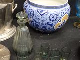 a table with a lot of glass items on it