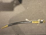 a black and gold pipe sitting on top of a table