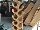 a picture of a wine rack made out of wine bottles