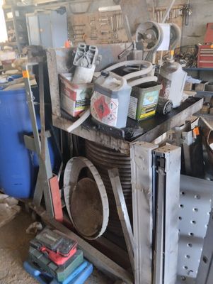 an image of a workbench in a garage with tools
