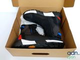 a box with a pair of shoes inside of it
