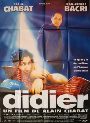 a movie poster of a man laying on a bed with a woman in the background