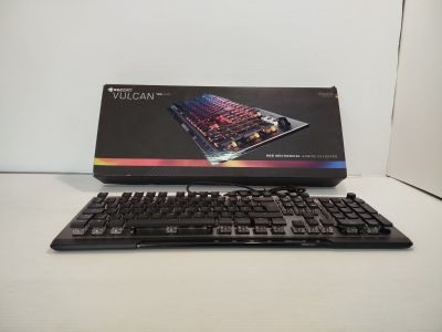 a box with a keyboard and a mouse on the table