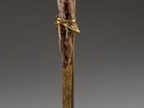 brass crucif with jesus on the cross on a pedestal