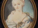 painting of a woman in a blue dress holding a cat