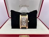 a cartier watch in a red box on a white surface