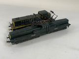 a toy train that is sitting on a white surface