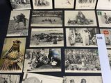 several old black and white photographs of native americans on a table