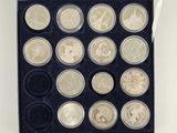 an image of a box of coins with a lot of coins