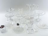 a lot of glass items that are on the table