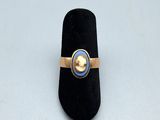 une image représentant une bague sertie d'une perle