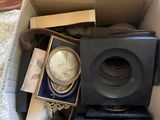 a box full of items that are sitting on the floor