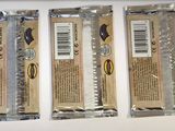 three packages of chocolate sitting on a table