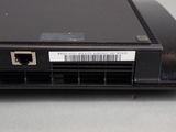 a close up of a laptop with a barcode on the back