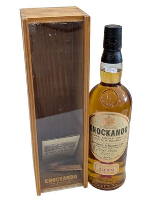 an image of a bottle of knockando whisky in a wooden box