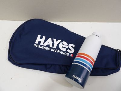 a blue bag with a bottle of water next to it