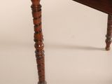 an image of a wooden table with a glass top