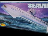 a picture of a model of a submarine in a box