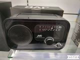 une radio posée sur une table en verre