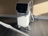 a room that has a machine on the floor in it