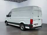 an image of a white van parked in a room