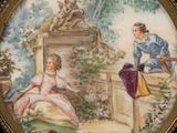a picture of a picture of a woman and a man in a garden