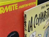 two books that are sitting next to each other on a table