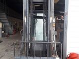 a forklift that is parked in a garage