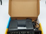 a box with a radio inside of it on a table
